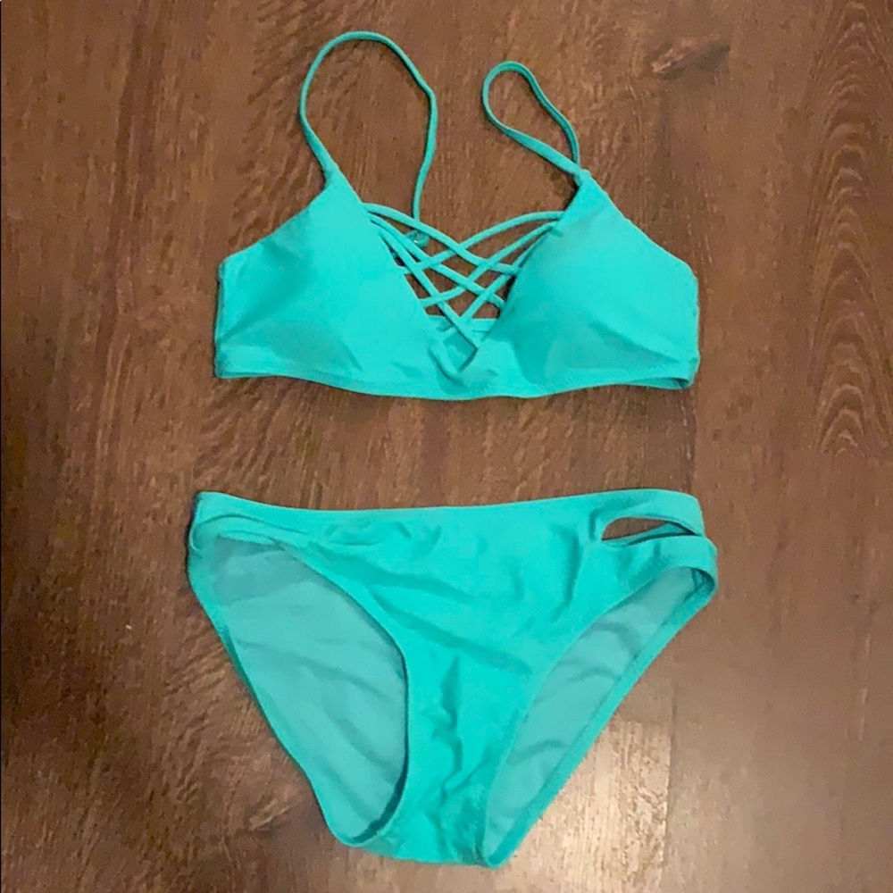 Never worn turquoise bikini (too small to model)